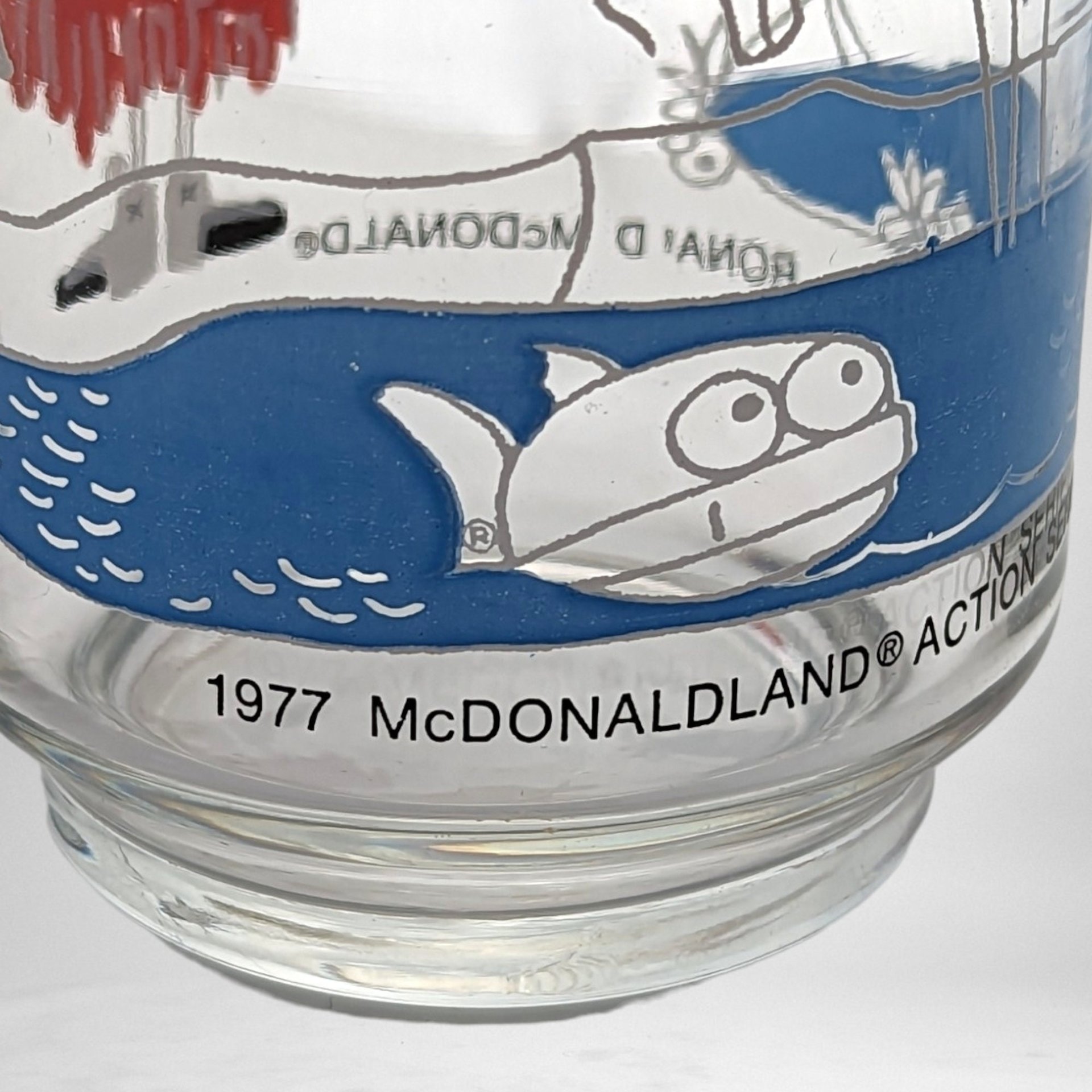 Pair of 1977 McDonald's Action Series Collectible Glasses - Retro Fast Food Memorabilia