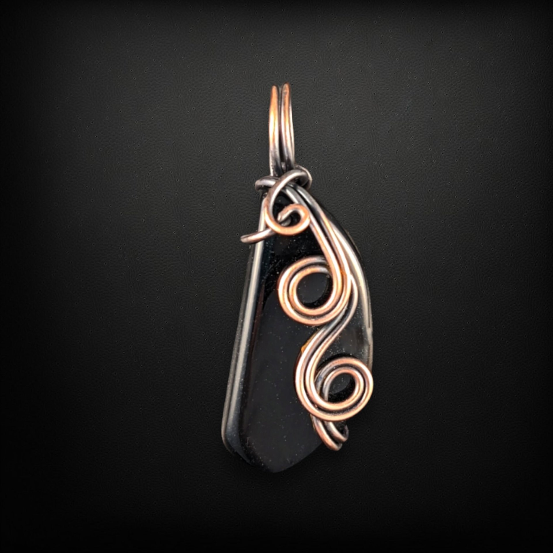 Artisan Elegance: Handmade Copper Wire Wrapped Black Onyx Pendant