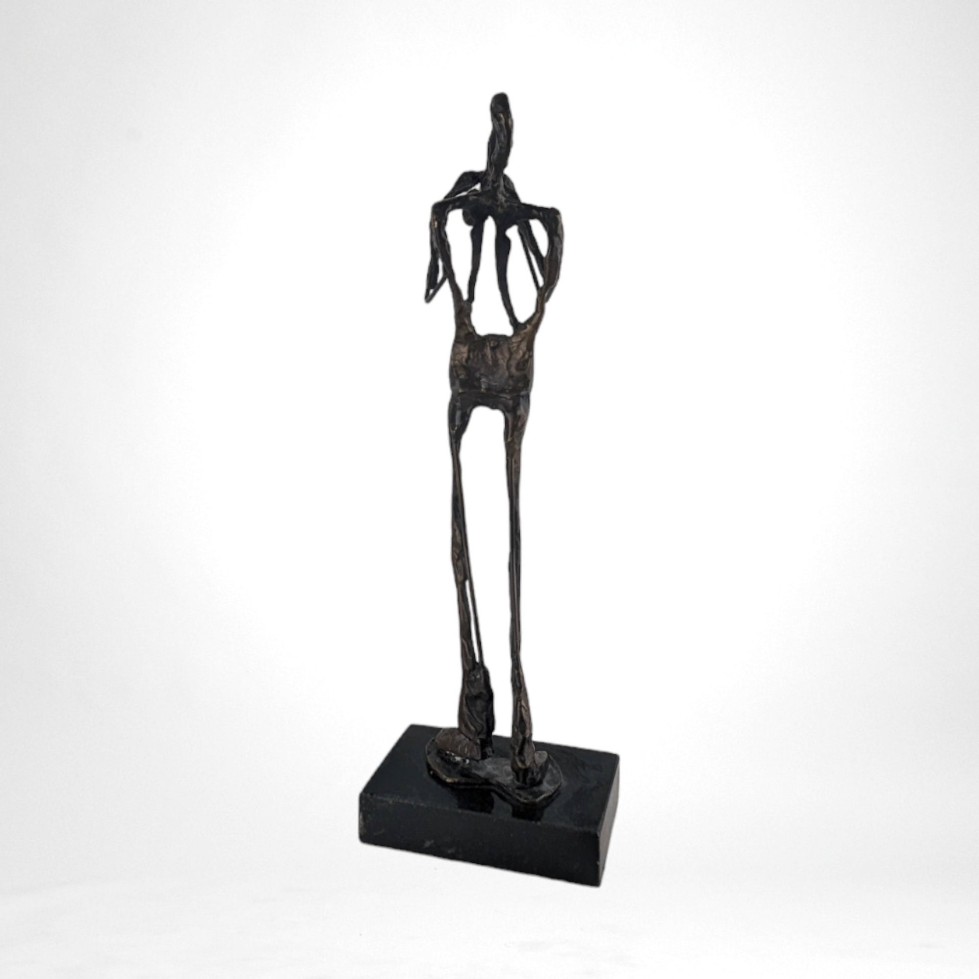 Swingin' Statue: Bronze Horn Player Blows Away in Vintage Charm