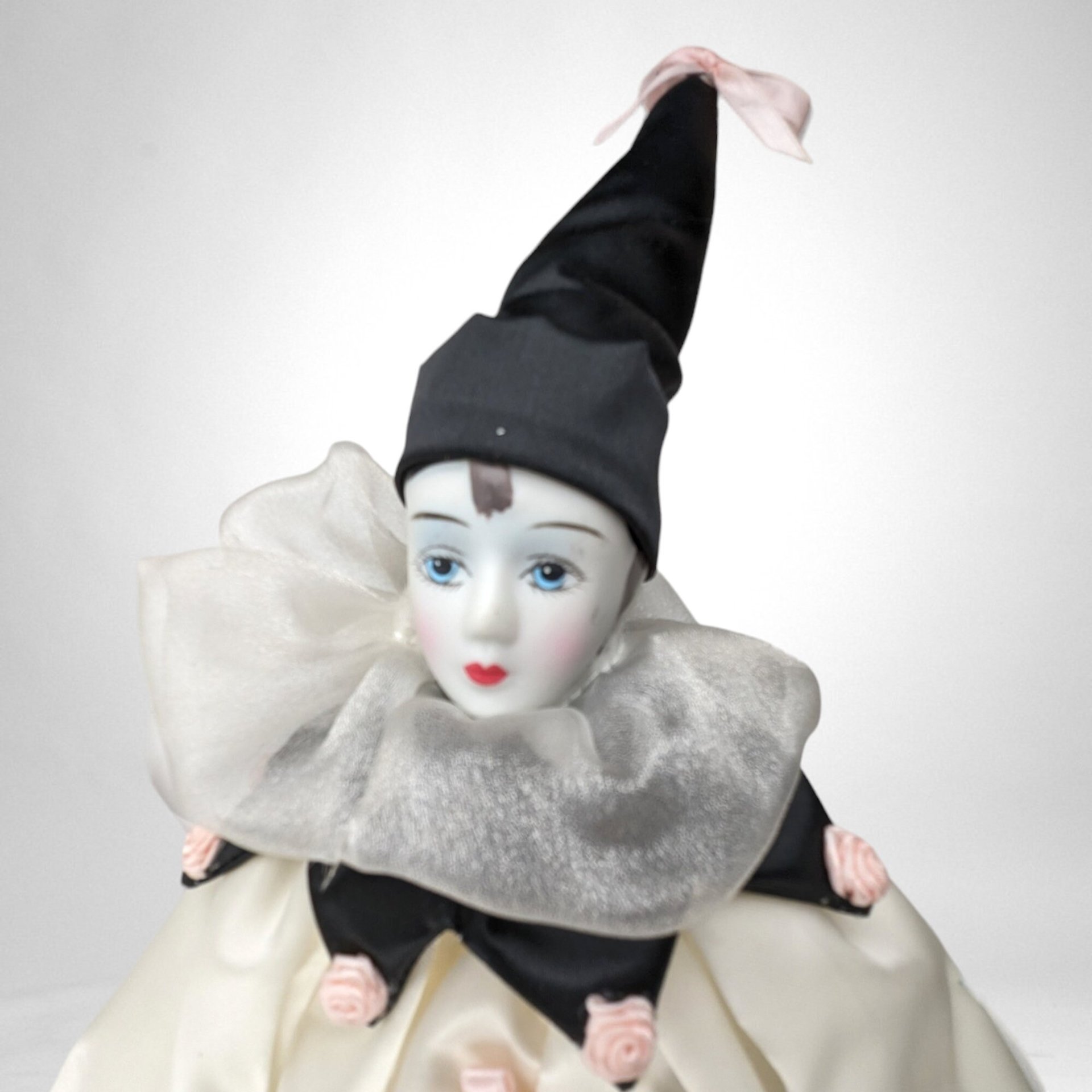 Vintage 19" Porcelain Harlequin Doll, Black and White with Pink Flowers