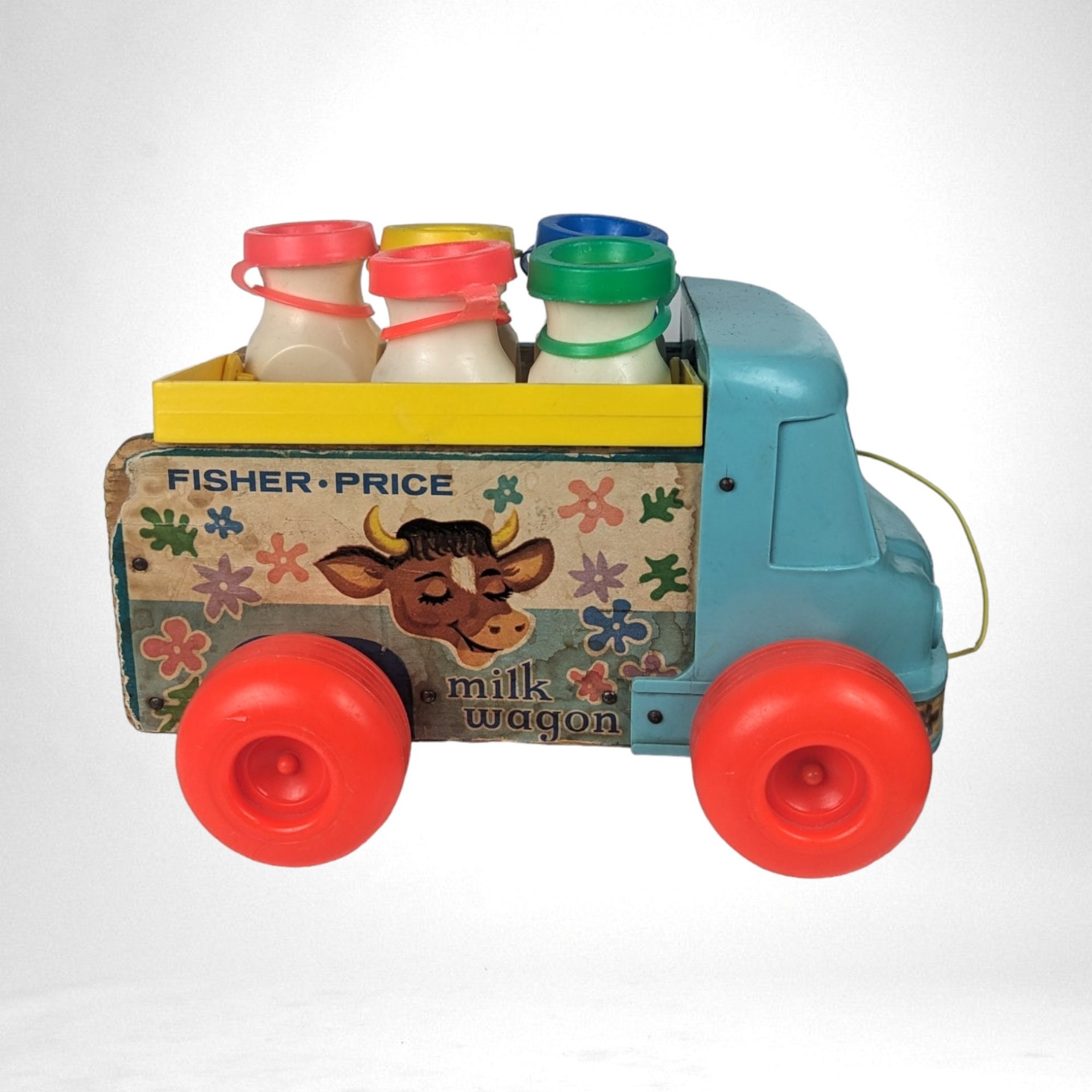 1965 Fisher Price Milk Wagon Pull Toy