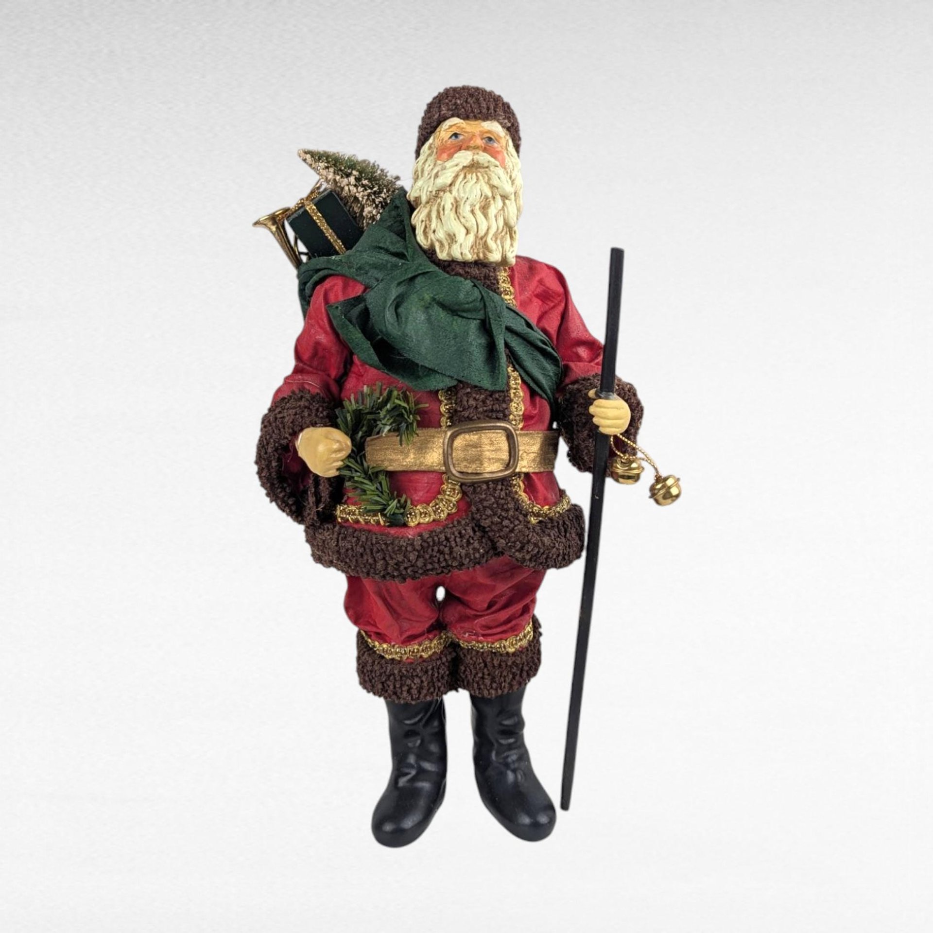 Vintage Santa with Stiff Clothing and Pole with a Bag of Gifts 