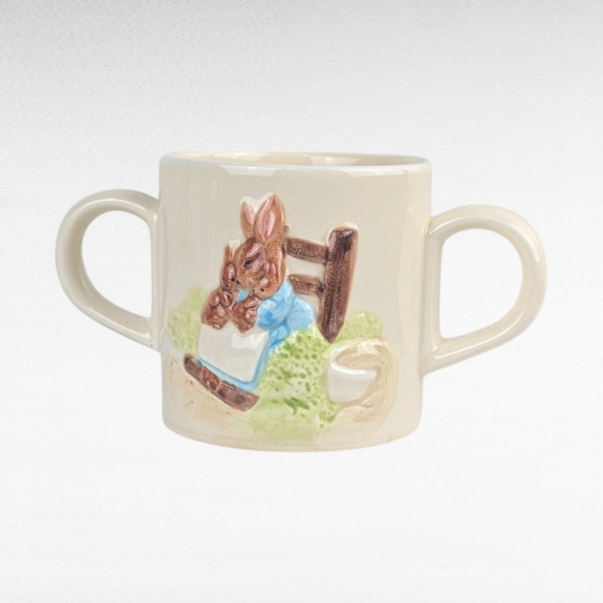1987 Schmid Beatrix Potter The Tale of Mrs. Rabbit 2 Handled Ceramic Cup. 