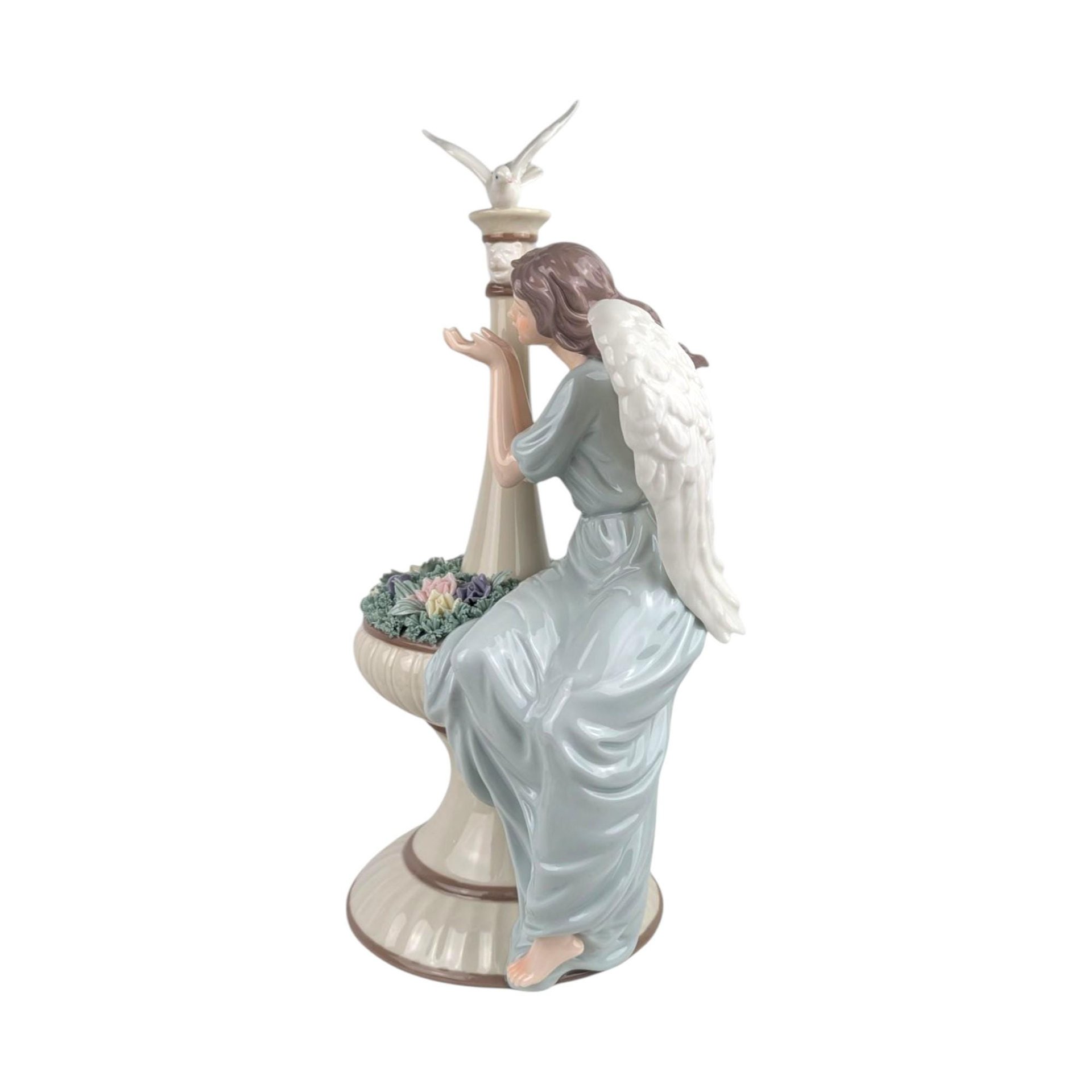 Grandeur Noel Porcelain Angel Figurine: Christmas Serenity Decor