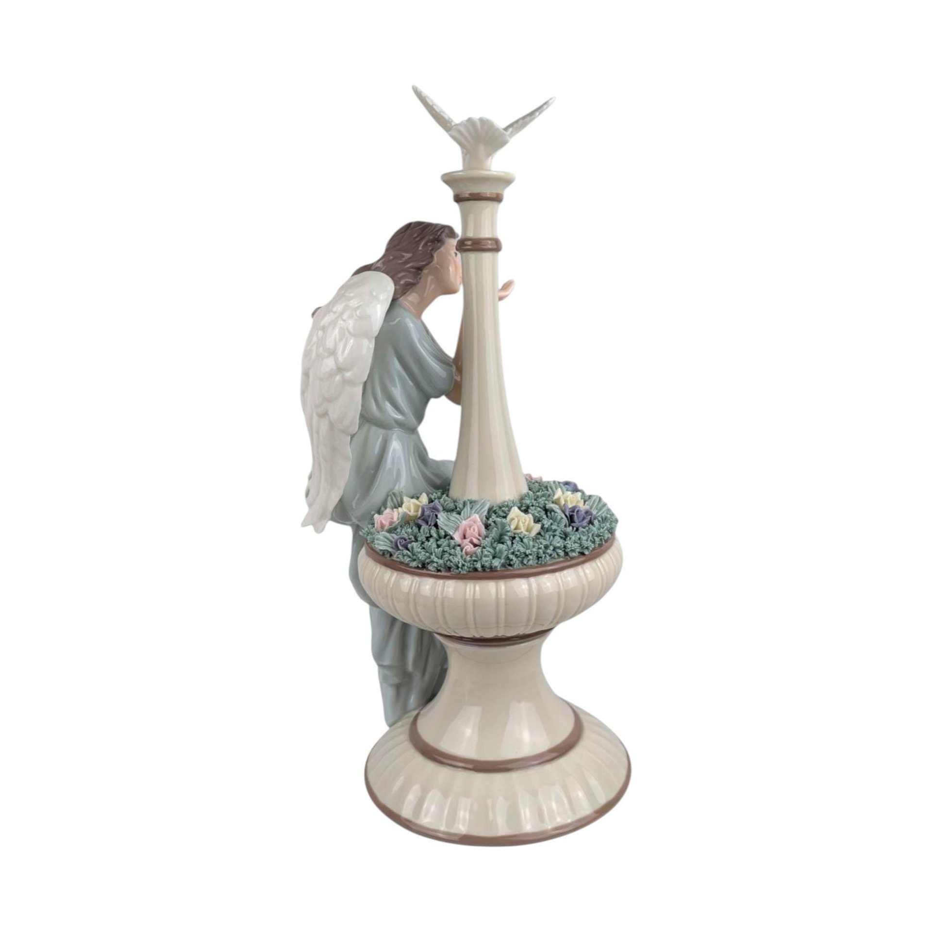 Grandeur Noel Porcelain Angel Figurine: Christmas Serenity Decor