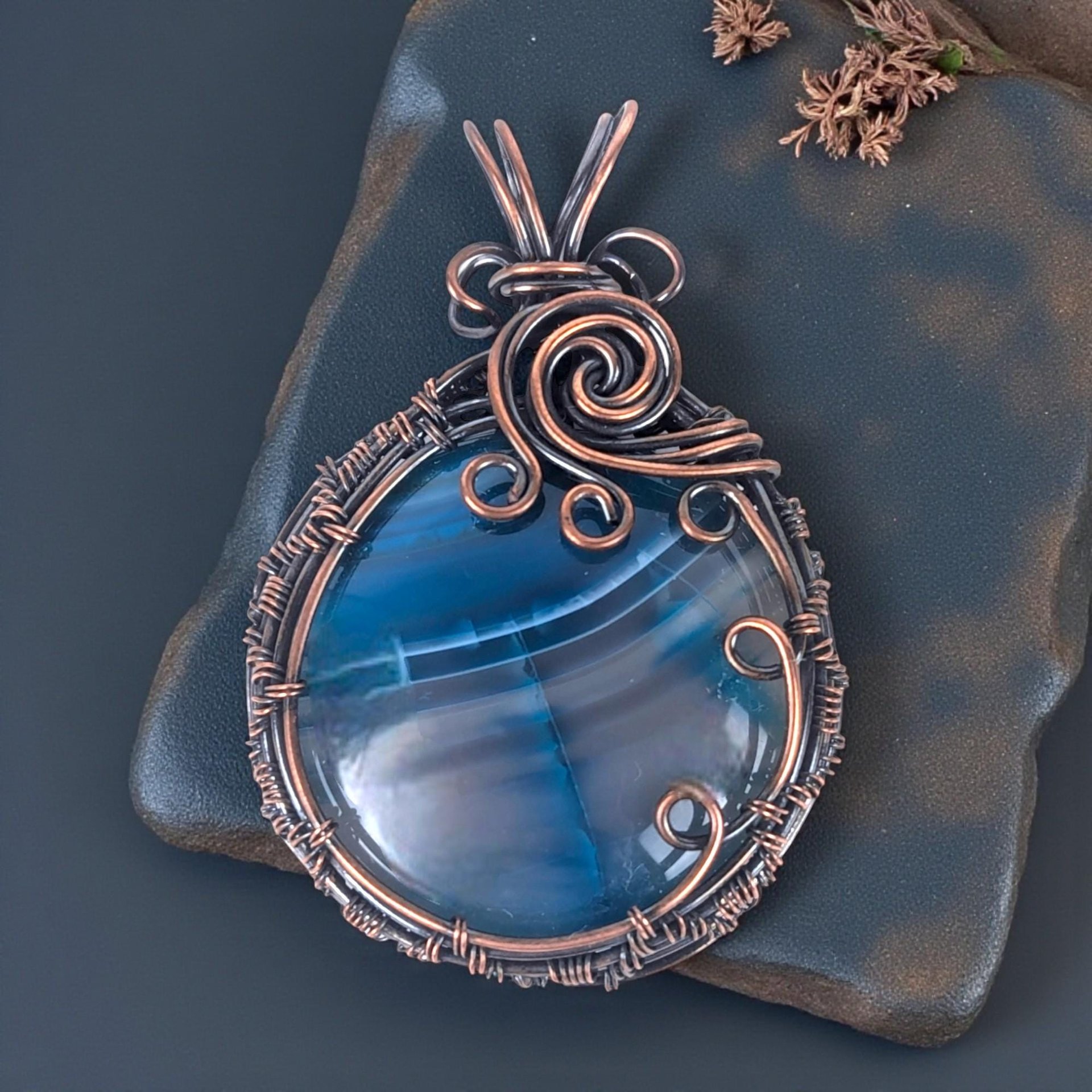 Copper Wire Wrapped Agate Pendant: Blue Striped Gemstone with Swirls
