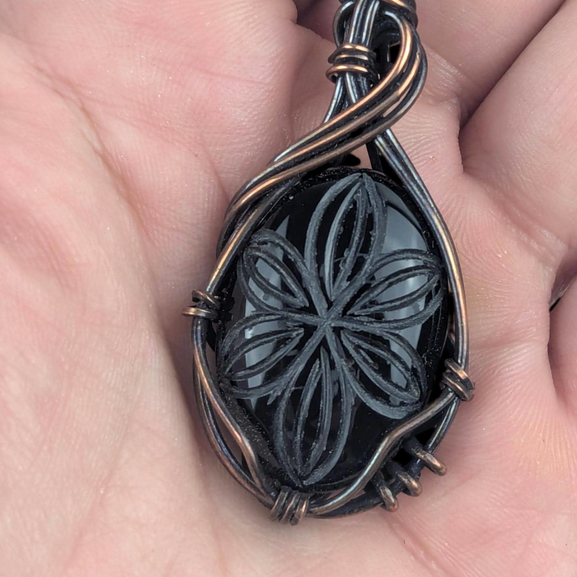 Handmade Copper Wire Black Onyx Pendant: Carved Gemstone Jewelry