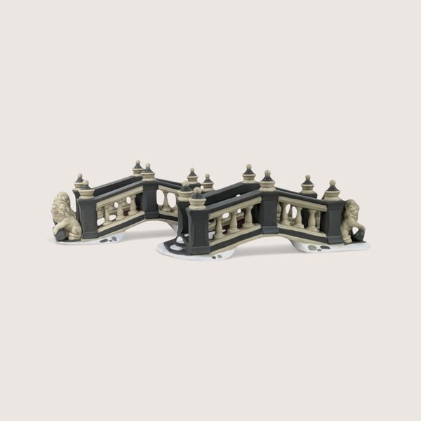 A pair of Department 56 Heritage Village ceramic Lionhead Bridges featuring gray arches and lion statues.