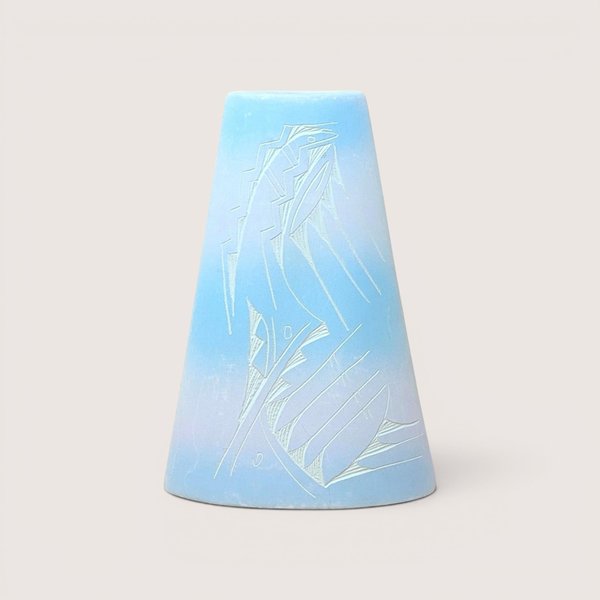 A conical light blue ceramic vase with an etched abstract geometric design, centered on a beige background.