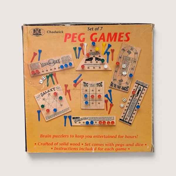 Vintage 1980s Chadwick Set of 7 Peg Games in original yellow box with colorful plastic pegs and wooden boards.
