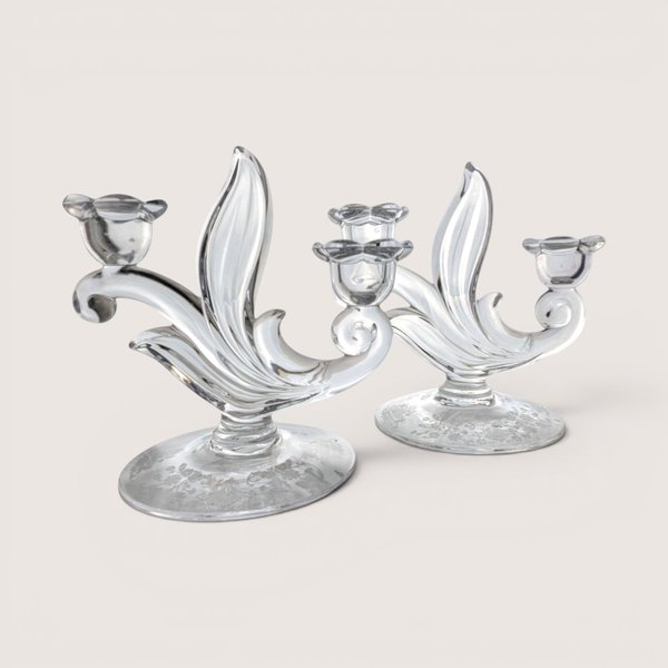 Pair of vintage Duncan Miller clear glass two-light candelabras with a delicate floral etched design on the oval bases.