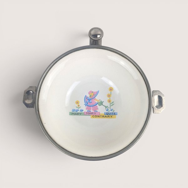 Vintage GW Company child's bowl featuring a Mary Mary Quite Contrary graphic and metal handles.