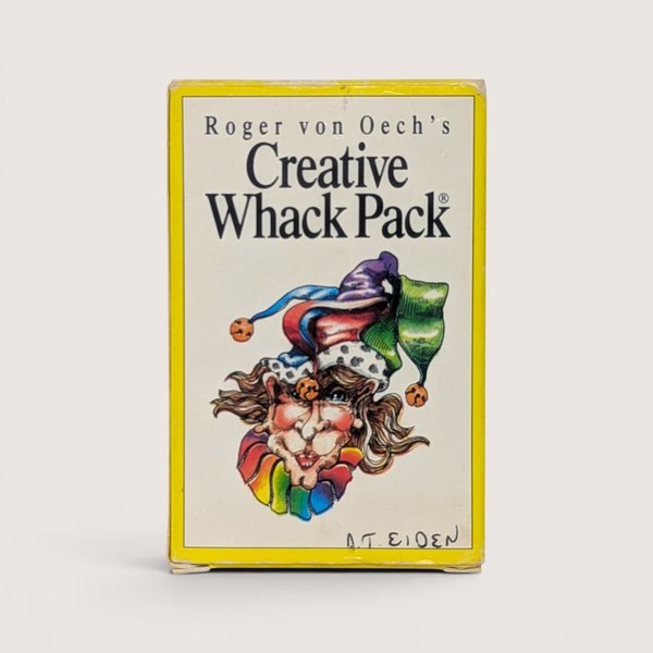Vintage 1992 Creative Whack Pack card deck box by Roger von Oech featuring an illustrated jester face.