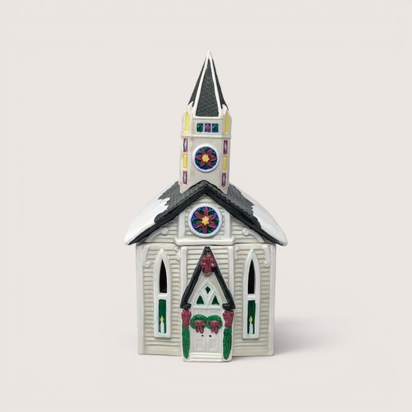 Vintage 1995 Claire Burke Christmas Memories handpainted ceramic church tealight candle holder luminary with a black steeple.