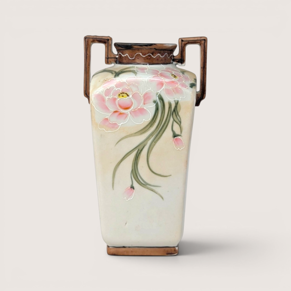 Antique four-sided Nippon porcelain vase hand-painted with pink peonies and trimmed with geometric handles on a linen background.