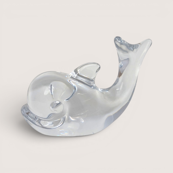 Signed clear crystal vintage Daum Nancy whale figurine paperweight featuring fluid minimalist curves.