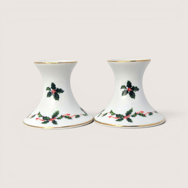 Pair of vintage Lefton white ceramic candlestick holders decorated with holly berries and a gold rim.