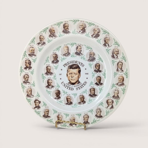 10 inch vintage ceramic collector plate featuring US presidents in a ring around John F. Kennedy.
