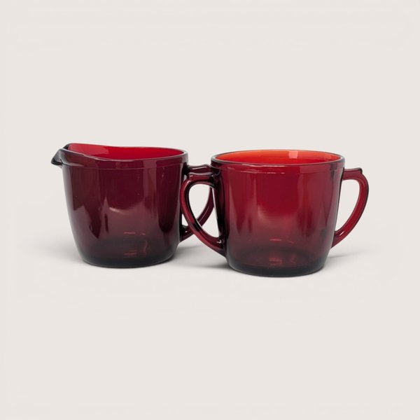 Vintage 1940s Anchor Hocking Royal Ruby red glass creamer and open sugar set with clean round silhouettes.