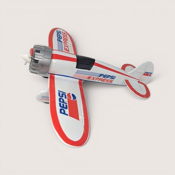 Vintage 1990s Ertl Pepsi Express Travel Air Model R Mystery Ship die-cast airplane coin bank in white and red livery with box.