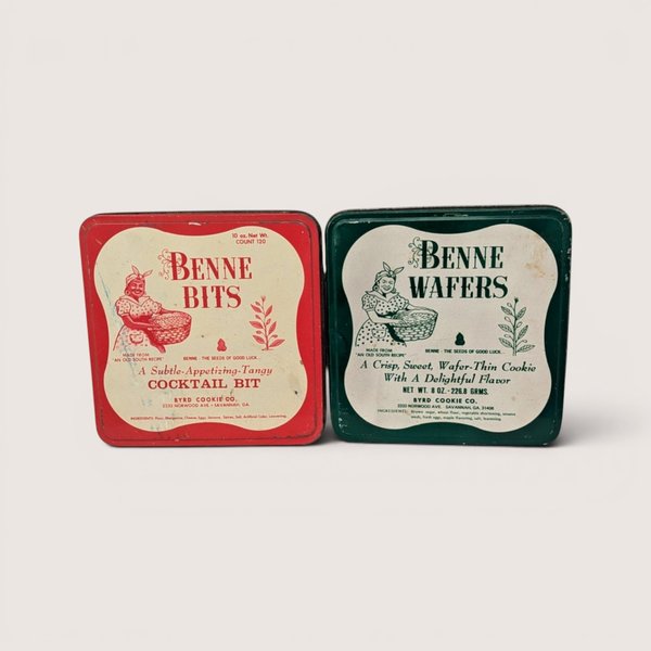 Pair of vintage square metal Byrd Cookie Co tins for Benne Bits in red and Benne Wafers in green from Savannah Georgia.