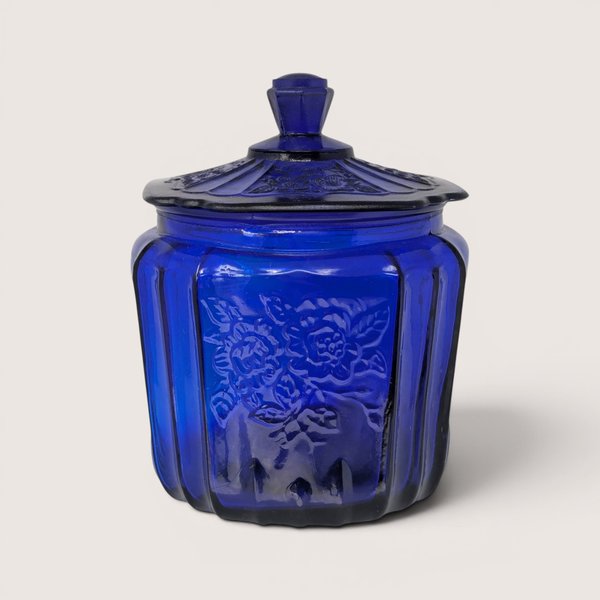 Vintage rich cobalt blue Anchor Hocking Mayfair Open Rose embossed glass cookie jar with matching lid.