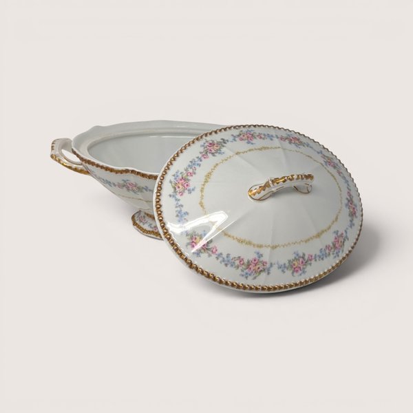 Antique Elite Works Limoges porcelain covered vegetable bowl with pink floral swags and gold trim, shown with its lid resting beside it.