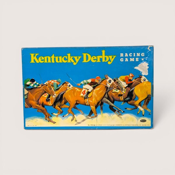 Vintage 1928 Whitman Kentucky Derby Racing Game box featuring colorful lithographed art of racing horses and jockeys on a blue background.