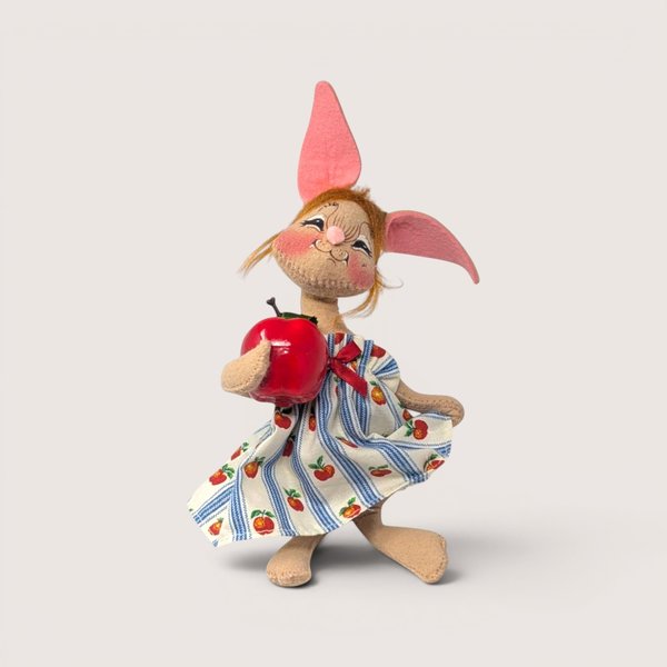 Vintage 1995 Annalee felt bunny doll holding an apple and wearing an apple print dress.