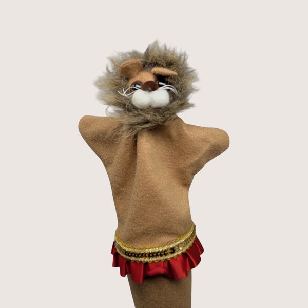 Vintage handmade felt lion puppet with a fluffy faux fur mane and red ruffled skirt with gold trim.