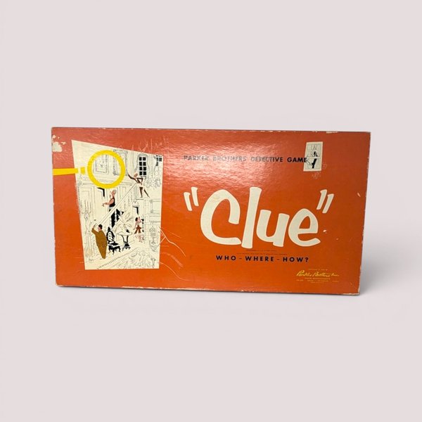 Vintage 1956 Parker Brothers Clue board game box in orange with classic illustration.