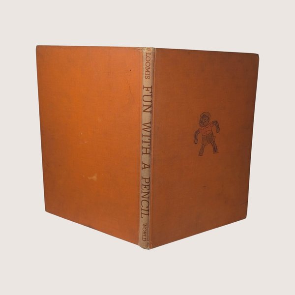 Vintage 1945 Fun with a Pencil hardcover drawing book by Andrew Loomis with orange cover.