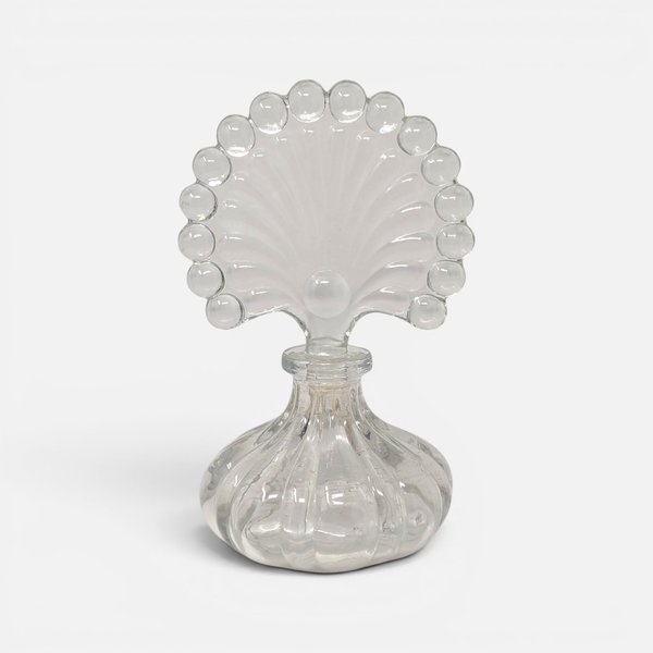 Vintage clear glass ribbed melon perfume bottle with large beaded fan shaped glass stopper