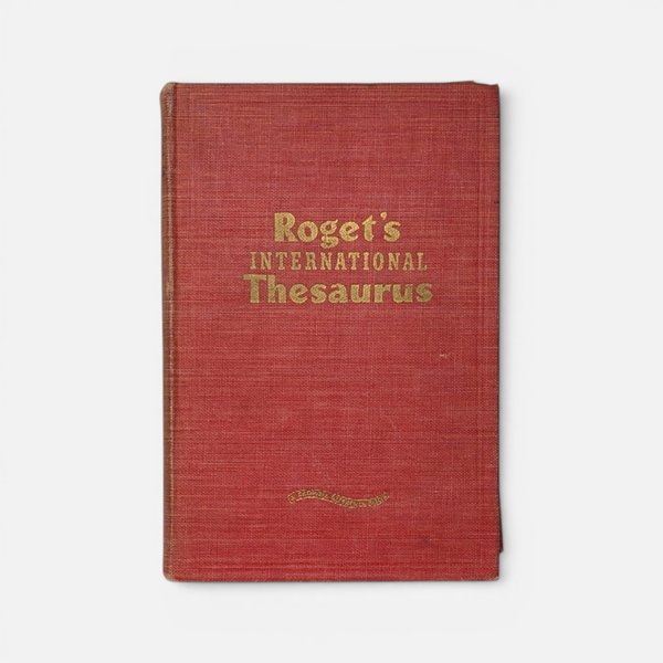 Vintage 1946 Roget's International Thesaurus hardcover in red cloth on a plain background.