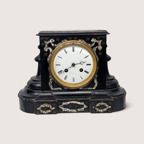 19th-century Japy Freres black lacquer mantel clock with intricate mother of pearl inlay and a white enamel dial.