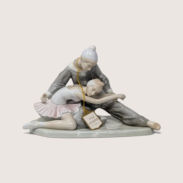 1980s Paul Sebastian fine porcelain figurine depicting a ballet dancer and companion with pastel glazes and original tag.