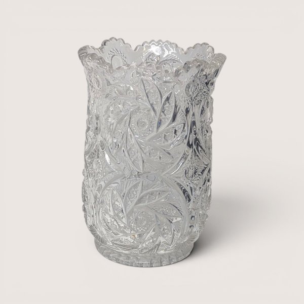 Stunning mid-century clear cut crystal vase with intricate starburst cut pattern and scalloped rim