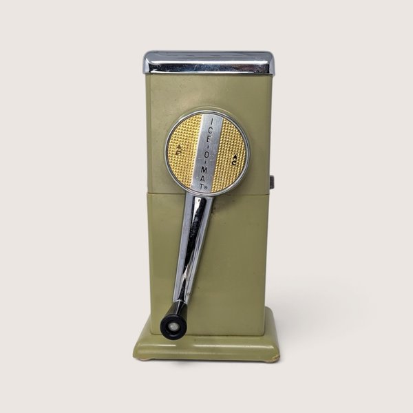 Vintage mid-century Rival Ice-O-Mat manual ice crusher in avocado green with chrome handle.