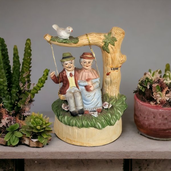 Artmark Ceramic Swinging Older Couple Music Box - Sentimental Melodies of Togetherness