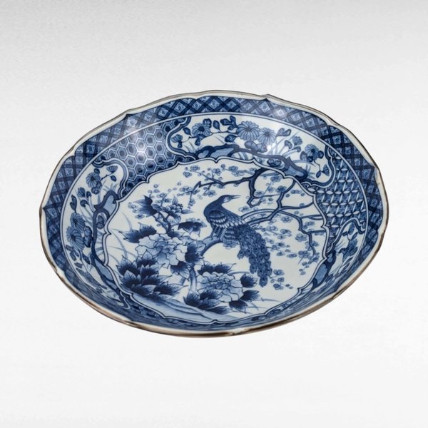 Vintage Japanese Blue and White Bowl with Peacock and Floral Design.
