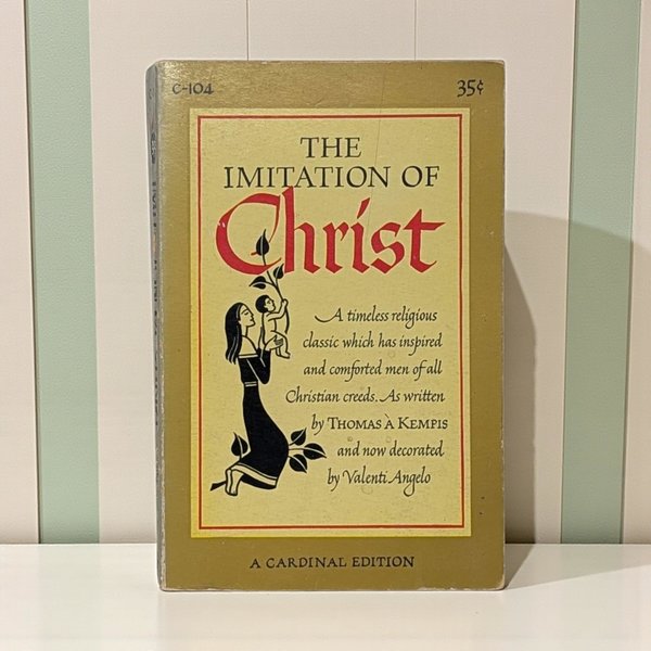 A vintage mass-market softcover edition of the religious classic, "The Imitation of Christ." The book features a mid-century Cardinal Edition cover design with traditional typography and a modest, scholarly silhouette.